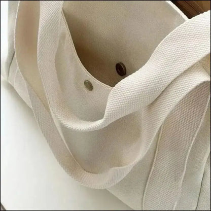 Canvas Women’s Shoulder Bag - Large Capacity Handbag with Multiple Outer Pockets Zipper Closure Shopping & Student Tote
