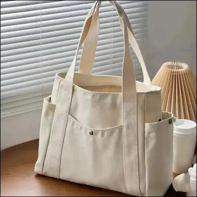 Canvas Women’s Shoulder Bag - Large Capacity Handbag with Multiple Outer Pockets Zipper Closure Shopping & Student Tote