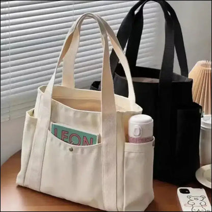 Canvas Women’s Shoulder Bag - Large Capacity Handbag with Multiple Outer Pockets Zipper Closure Shopping & Student Tote